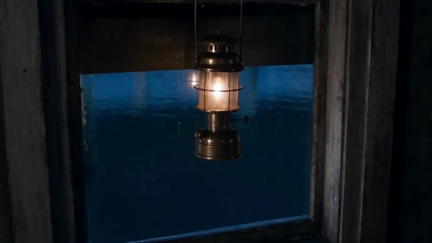 shift the scene to cool blue moonlight through the window, keep the lantern flame warm